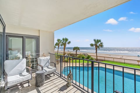 Have your morning coffee while enjoying the pool and oceanfront view.