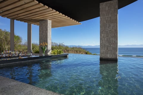 5 bars/lounges, swim-up bar, poolside bar, beach bar