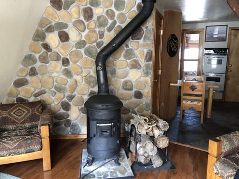 A-frame kitchen. You’ll find extra items here, utensils, coffee pot, etc.