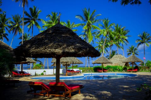 Outdoor pool, pool umbrellas, sun loungers