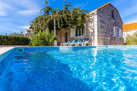 House (Four Bedroom House with Private Pool) | Pool | Seasonal outdoor pool, pool umbrellas, sun loungers