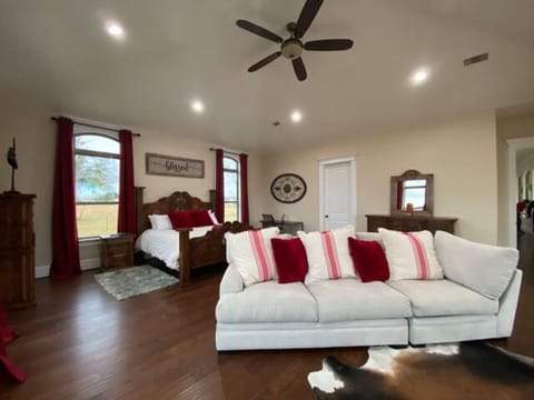 Master 1 with a King bed and a cozy sofa