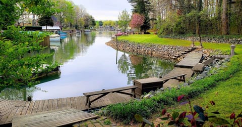 Fish, Sun, kayak or just sit on the private wrap around dock.