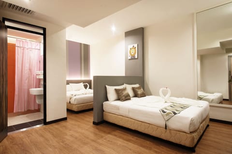 Family Room, 2 Double Beds, Non Smoking, City View | In-room safe, desk, iron/ironing board, free WiFi