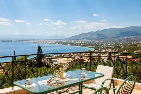 Savor Kalamata's scenic vista from the comfort of our patio
