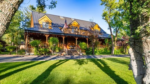 Front porch, upper deck and lawn area in front of home