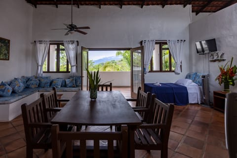 Deluxe Villa, 2 Bedrooms, Pool View | Living area | 32-inch flat-screen TV with digital channels, TV