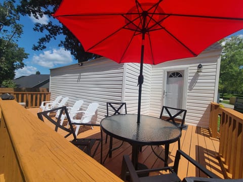 Backyard patio with charcoal grill 