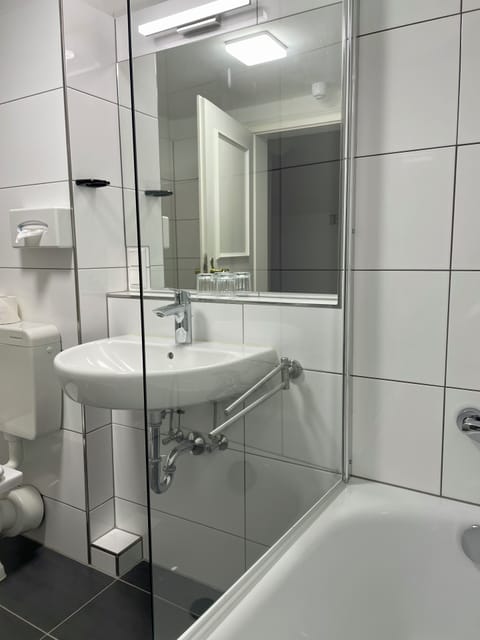 Eco-friendly toiletries, hair dryer, towels, soap