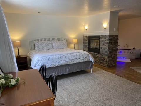King bed, Fire place, and large jetted tub. 