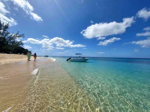 prestine beach just steps away from property