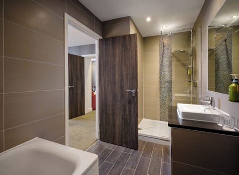 Suite, 1 Bedroom | Bathroom | Shower, hair dryer, towels