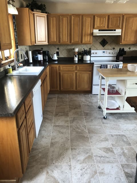 Spacious fully stocked with dining and cooking essentials. 