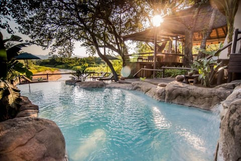 Outdoor pool, pool umbrellas, sun loungers