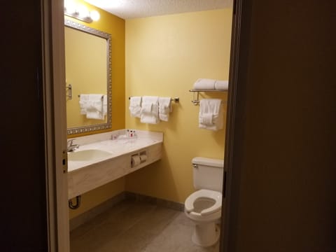 Standard Room, 2 Queen Beds | Bathroom | Combined shower/tub, free toiletries, hair dryer, towels