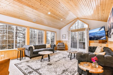 Living room with lofted ceilings