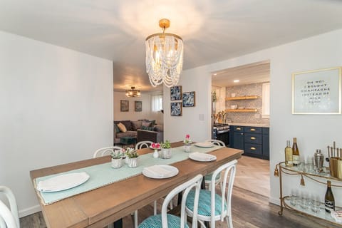 Cozy Dining room with an equipped bar cart for those yummy drinks.
