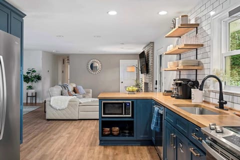 Make delicious meals in the charming kitchen, which offers plenty of counter space, stainless steel appliances, and all the cookware and dishes you need to feel at home.