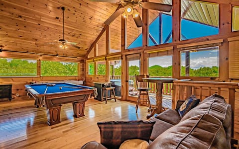 Game room with air hockey, pool table, and stunning mountain views.