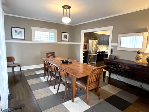 Huge dining room with handmade 9-foot farmhouse table seats 10.