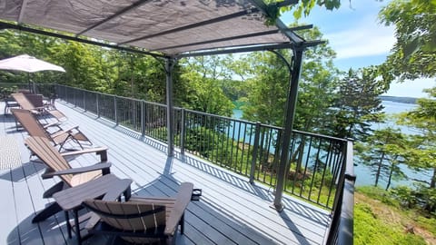 Expansive 50' water front deck accessible by two 6' sliders.
