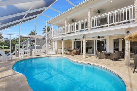 View of our private pool along with our upper and lower deck seating areas