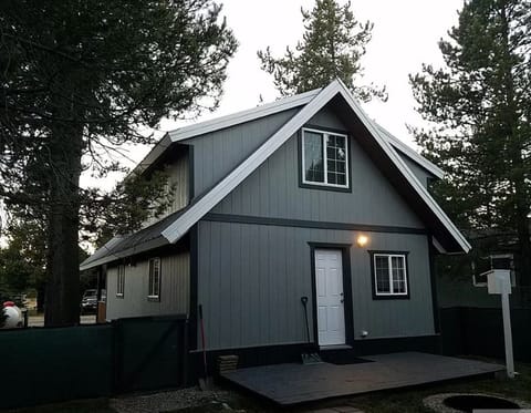 back of cottage showing fire pit