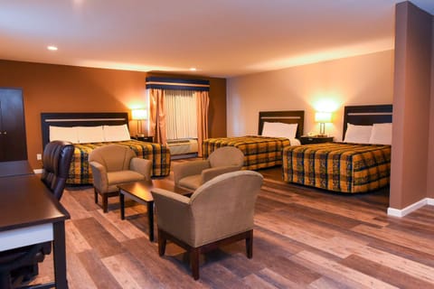 Signature Suite, 1 King Bed, 2 Double Beds, Non Smoking | Desk, free WiFi, bed sheets