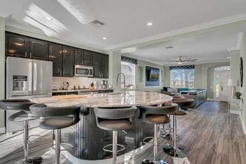 Modern Kitchen With Huge Granite Topped Island