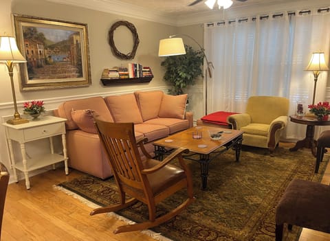Living room features a 58” Roku TV, board games, great books & seating up to 7