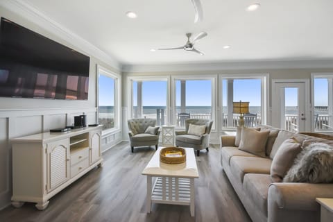 This fabulous oceanfront living room is perfect for family movie night.