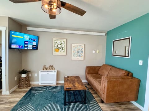 Cozy living room with updated furnishings. Roku TV with YouTube TV (cable) provided!