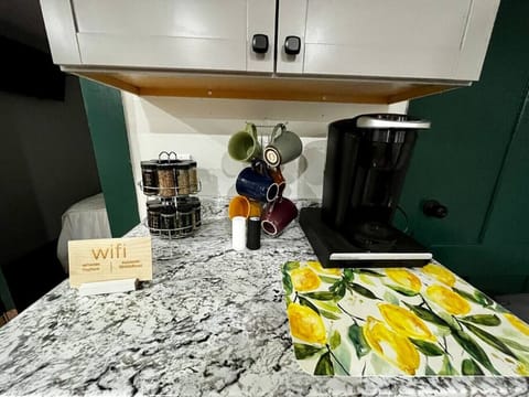 Keurig machine with K Cups, creamer, sugar, tea, etc.