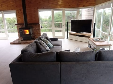 Upstairs living with wood burning heater