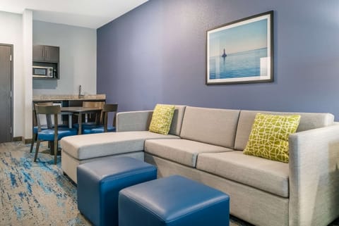 Desk, blackout drapes, iron/ironing board, free cribs/infant beds