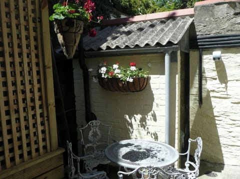 Private courtyard with table and chairs
