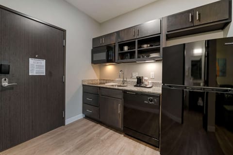 Desk, laptop workspace, blackout drapes, iron/ironing board