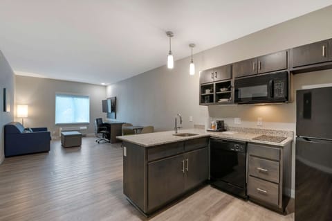 Desk, laptop workspace, blackout drapes, iron/ironing board