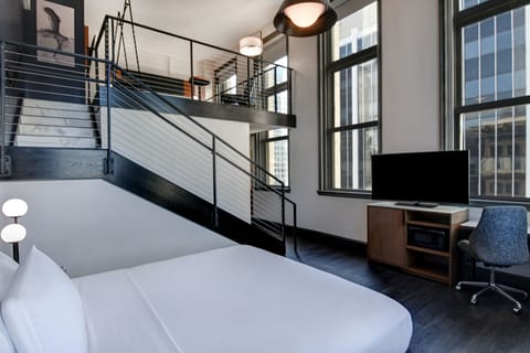 Desk, laptop workspace, iron/ironing board, free cribs/infant beds