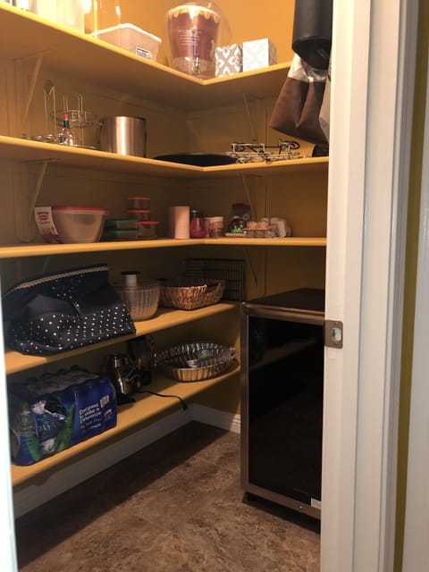 Pantry off the kitchen; wine chilling fridge.