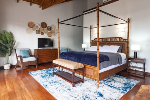 The primary suite boasts updated, beautiful decor, featuring a serene and stylish design that offers a perfect blend of comfort and elegance for your stay.