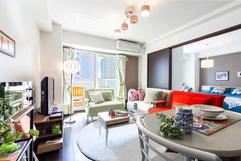Apartment, Non Smoking | Living area | Flat-screen TV