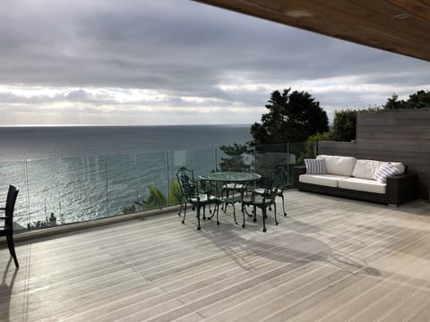 The veranda, overlooking the Cornish coast, directly above the SW coast path. 
