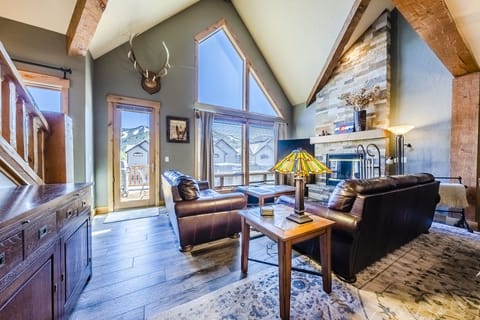 Living Room - Spacious, mountain modern design. All the comforts of home. Gas fireplace. Large windows for plenty of natural light.