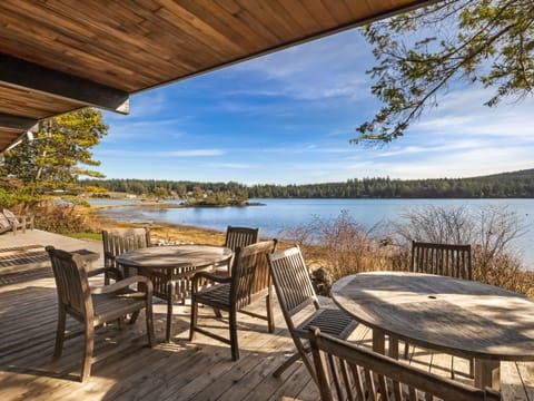 Relax on this deck just above the waters edge