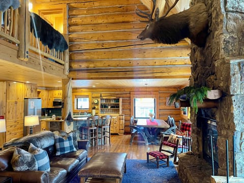 Main floor living area with wood fire place 