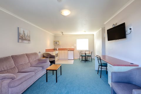 Apartment, 2 Bedrooms | Living area | 32-inch flat-screen TV with digital channels, TV, DVD player