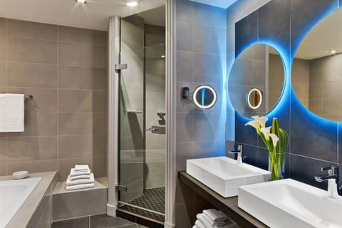 Rainfall showerhead, eco-friendly toiletries, hair dryer, towels