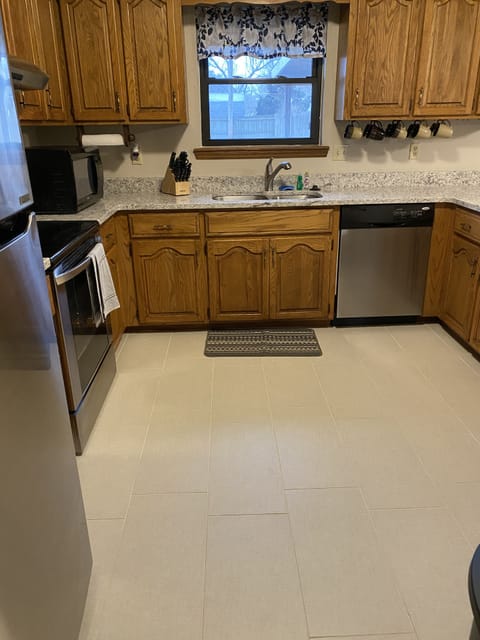 Refrigerator includes an icemaker.