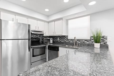 Sleek and updated kitchen with plenty of counter space